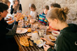 © Lea Jones/Stocksy - festive family breakfast at rustic table
