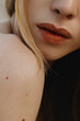 © Anastasia Mihaylova (Shpara)/Stocksy - Close-up sensual woman's big plump lips of anonymous woman