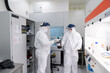 © Hernandez & Sorokina/Stocksy - Two Researchers Working At Clean Room