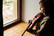 © valbar STUDIO/Stocksy - kid playing violin