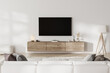 © Oleksandr Shcherban/Stocksy - Living room interior with TV screen in front of couch. home interior