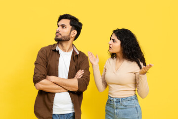 Disagreement Concept With Young Couple Arguing On Yellow Background, Relationship Difficulties, Communication Issues