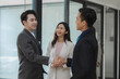 Handshake in contemporary office space, handshake and meeting in teamwork, hiring or partnership together at office, professional and employees with handshake for agreement,