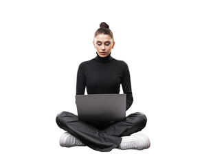 Wall Mural - A young woman sits cross-legged using a laptop, isolated on a white background, depicting the concept of modern work flexibility
