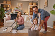 © Stockphotodirectors - Little girl and dad laughing while playing with the laundry basket in living room