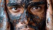 determined gaze: Southern European model with a mud mask for wellness