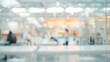 © Oleksandr - Blurred background of an office with desks and people working