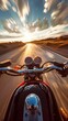 Motorcyclist speeding down the road during golden hour