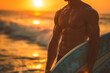 Muscular surfer by the ocean at sunset with a surfboard without a face close-up