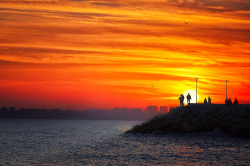 Wall Mural - Sunset on the Mersin City. Mersin is a large city spreading out along the coast,it has the longest seashore in Turkey as well as in the Eastern Mediterranean.