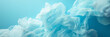 An abstract, panoramic image of ruffled blue fabric that gives the illusion of gentle waves or soft clouds.