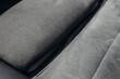 Grey alcantara texture. Close up car seat fabric material. Surface of leatherette for textured background. 