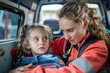 Friendly paramedic comforting young patient before transporting her to hospital