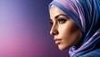   A woman in a blue-pink hijab closes up, her long hair in a low ponytail