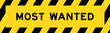 © bankrx - Yellow and black color with line striped label banner with word most wanted