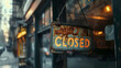 Closeup on a Closed sign hanging in a dusty business window, a powerful concept of economic shifts