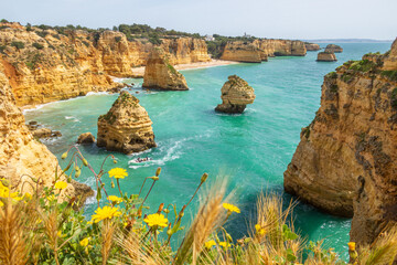 Wall Mural - Cliffs and ocean near Praia da Marinha, Algarve, Portugal