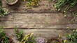 Flat lay composition of medicinal herbs and flowers on a rustic wooden background