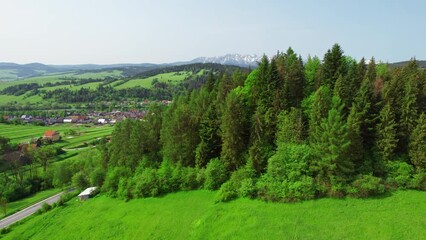 Wall Mural - Aerial view of the Polish countryside with the Tatra Mountains in Poland