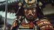 Close-up portrait of a samurai warrior in traditional armor with vivid facial paint. Historical and cultural concept