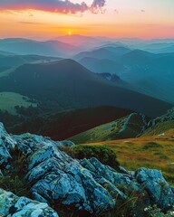 Sunset over majestic mountain peaks.