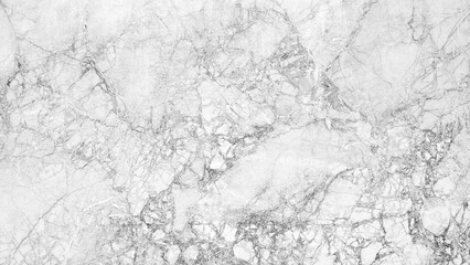 Poster - A white marble wall with a few small rocks. The wall is very smooth and has a very clean look