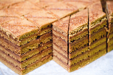 Poster - A stack of brownies with a crosshatch pattern. The brownies are cut into squares and arranged in a pyramid shape