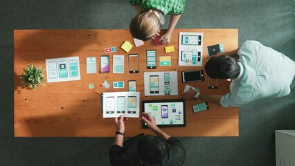 Fototapete - time lapse of software developer working on ux ui design while manager walk at meeting table. team w
