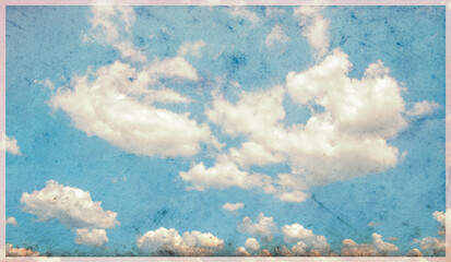 Wall Mural - grunge blue sky and white clouds with vintage effect.