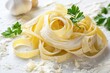 Fresh Italian Fettuccine Pasta with Flour and Parsley on White Background - Authentic Macaroni, Tagliatelle, Spaghetti, Linguine Noodles