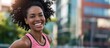 Happy smiling black woman athlete. Joyful laughing African-American female, girl portrait