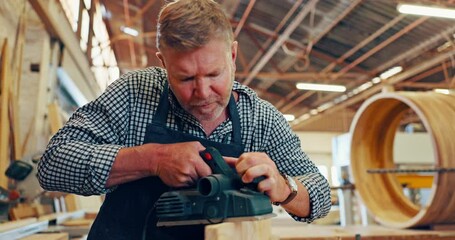 Canvas Print - Carpenter, construction and man with machine for manufacturing, production and woodwork. Wood, equipment and contractor with labor for building project, creative career or small business in warehouse