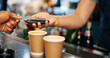 © peopleimages.com - Customer, hands and credit card at coffee shop POS, fintech payment and cafe, restaurant or small business services. Barista or people hands at point of sale counter, machine and scan for drink order
