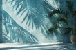 Tropical summer background, 3D studio room with palm leaf shadows on blue cement wall, holiday web banner concept