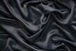 texture, background, pattern. Black silk fabric. It is black and heat resistant with gray. Transform its tougher drape into a design for any event. It is a crispy, lightly textured hand.