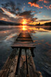 Harmonic Tranquillity: Serene Lake at Sunset with Rustic Dock and Far-off Lighthouse