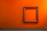 Fototapeta  - An art gallery with an orange wall, where a single, empty tangerine frame hangs. The frame's vibrant color pops against the muted background, drawing the eye directly to it.