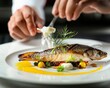 Chef crafts sea bass into an opulent dish
