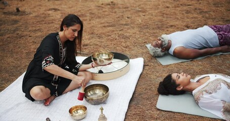 Sticker - Tibetan, meditation and people outdoor with sound for indigenous spiritual healing in holistic practice. Soul, music and relax to calm vibration of singing bowl in nature with peace from instrument