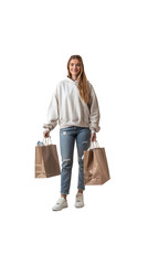 Front view of beautiful young woman standing holding shopping bags