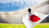 Fototapeta Na ścianę - Japan football team supporter on stadium.
