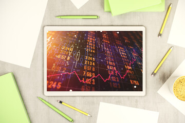 Poster - Modern digital tablet monitor with abstract creative statistics data hologram, statistics and analytics concept. Top view. 3D Rendering