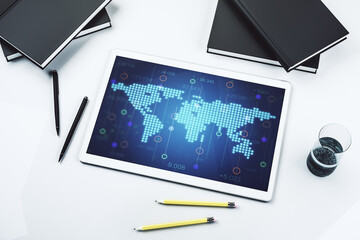 Poster - Abstract creative world map on modern digital tablet monitor, tourism and traveling concept. Top view. 3D Rendering
