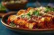 An enchilada plate smothered in red sauce and topped with crumbled cheese
