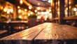 a wooden table is seen in the foreground with a blurred background created by the soft glow of restaurant lights the focus is on the texture and simplicity of the table against the abstract backdrop