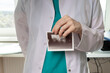 Gynecological ultrasound in doctor's hands, examining a woman's pelvic organ, medical scan for female health