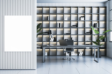 Poster - Modern office with shelves or library interior with workplace and mock up banner on wall. 3D Rendering.
