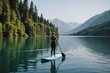 A woman,  Stand Up Paddleboarding (SUP)  in calm waters in Lake.