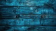 A blue wooden background with a few brown spots