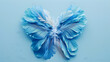 Colorful feathers shaped like a butterfly on a powder blue background